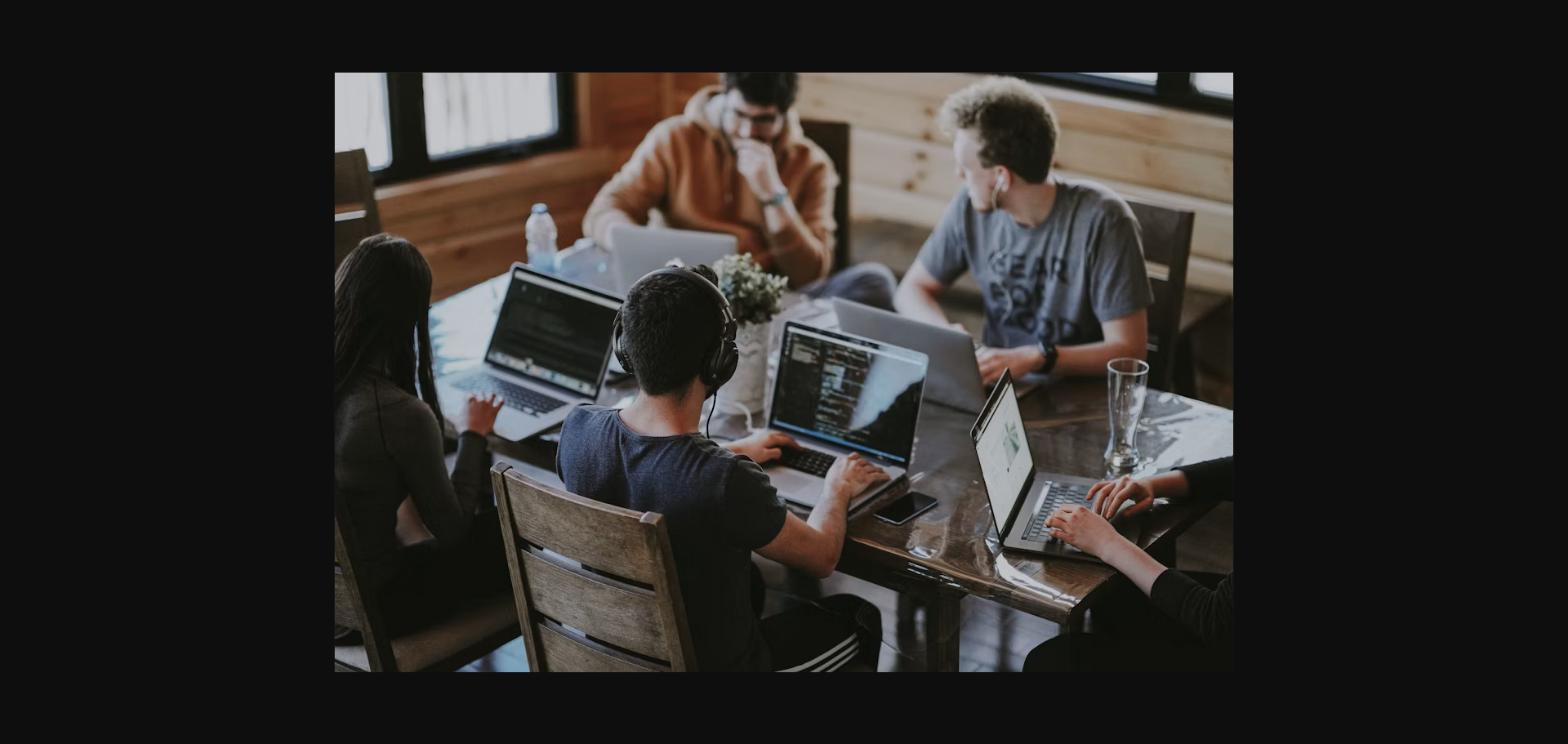 Archean Consulting engineers collaborating on an enterprise systems project
